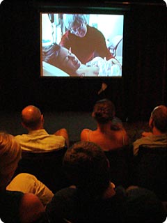 Class watches video of birth.